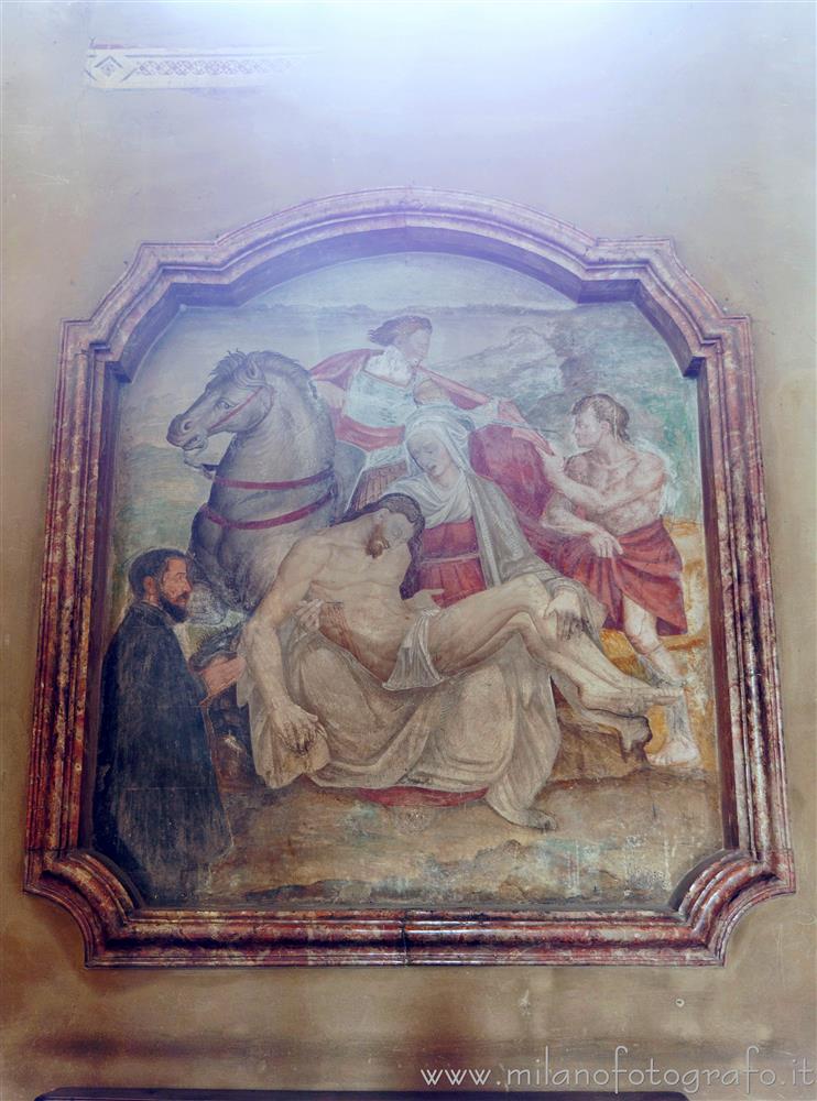 Milan (Italy) - Pietà with San Martino and offerer on a wall of the Basilica of San Lorenzo Maggiore